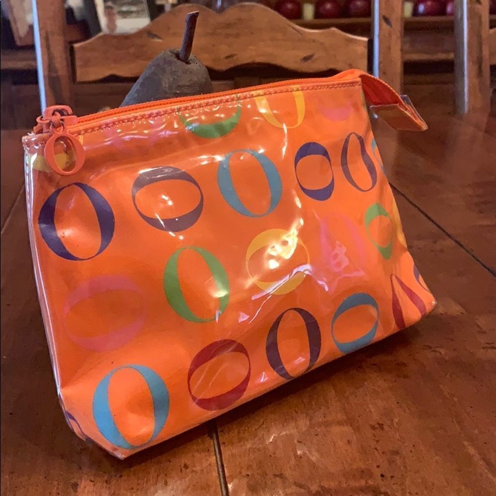 Never used Rare Oprah Orange O Logo Cosmetic bag.